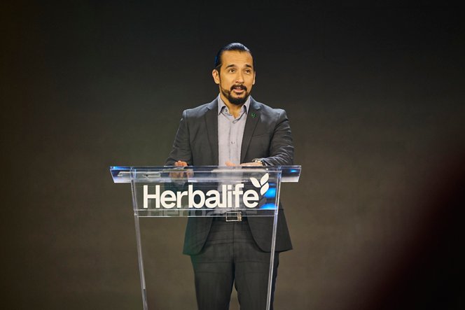 New Herbalife CEO Stephan Gratziani speaking at the opening keynote address at Honors 2025 in Los Angeles