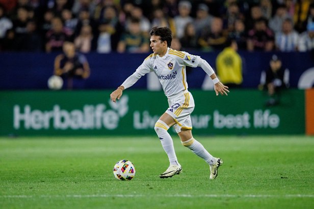 An Herbalife-sponsored athlete playing professional soccer. 