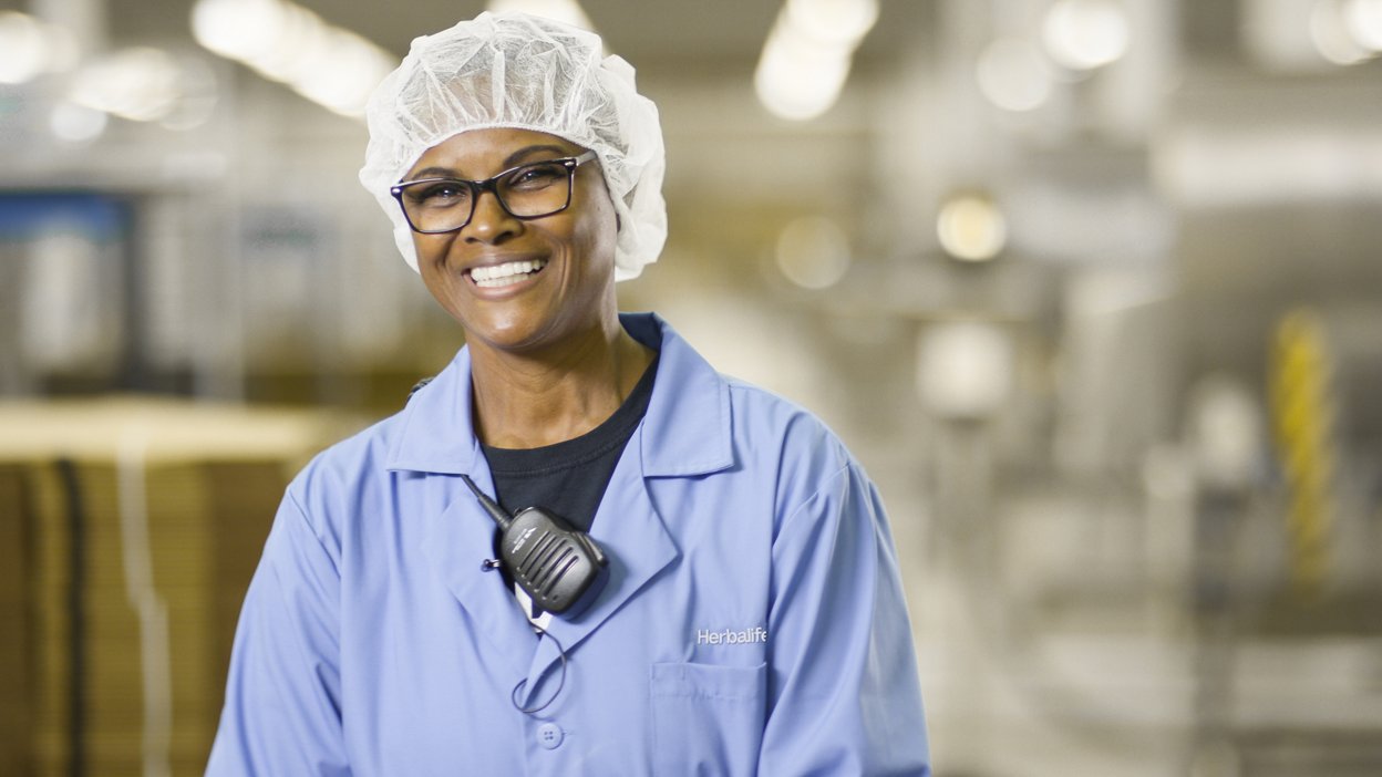 Herbalife Innovations and Manufacturing employee smiling