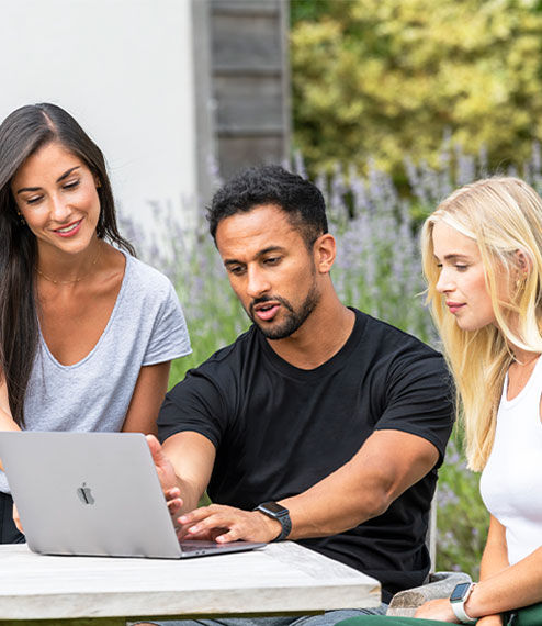 People in front of a computer